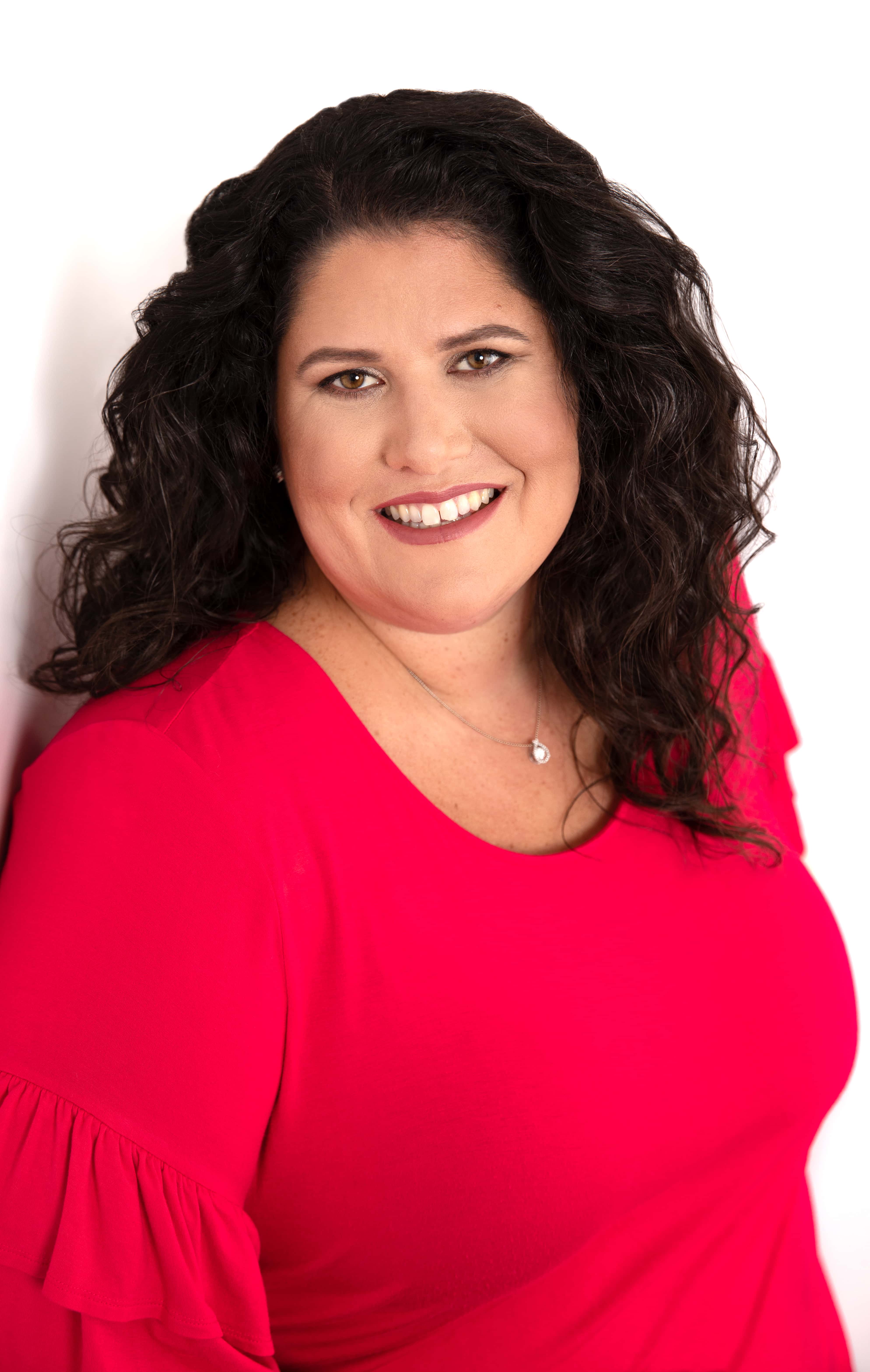 professional headshot of girl wearing crimson top ocala