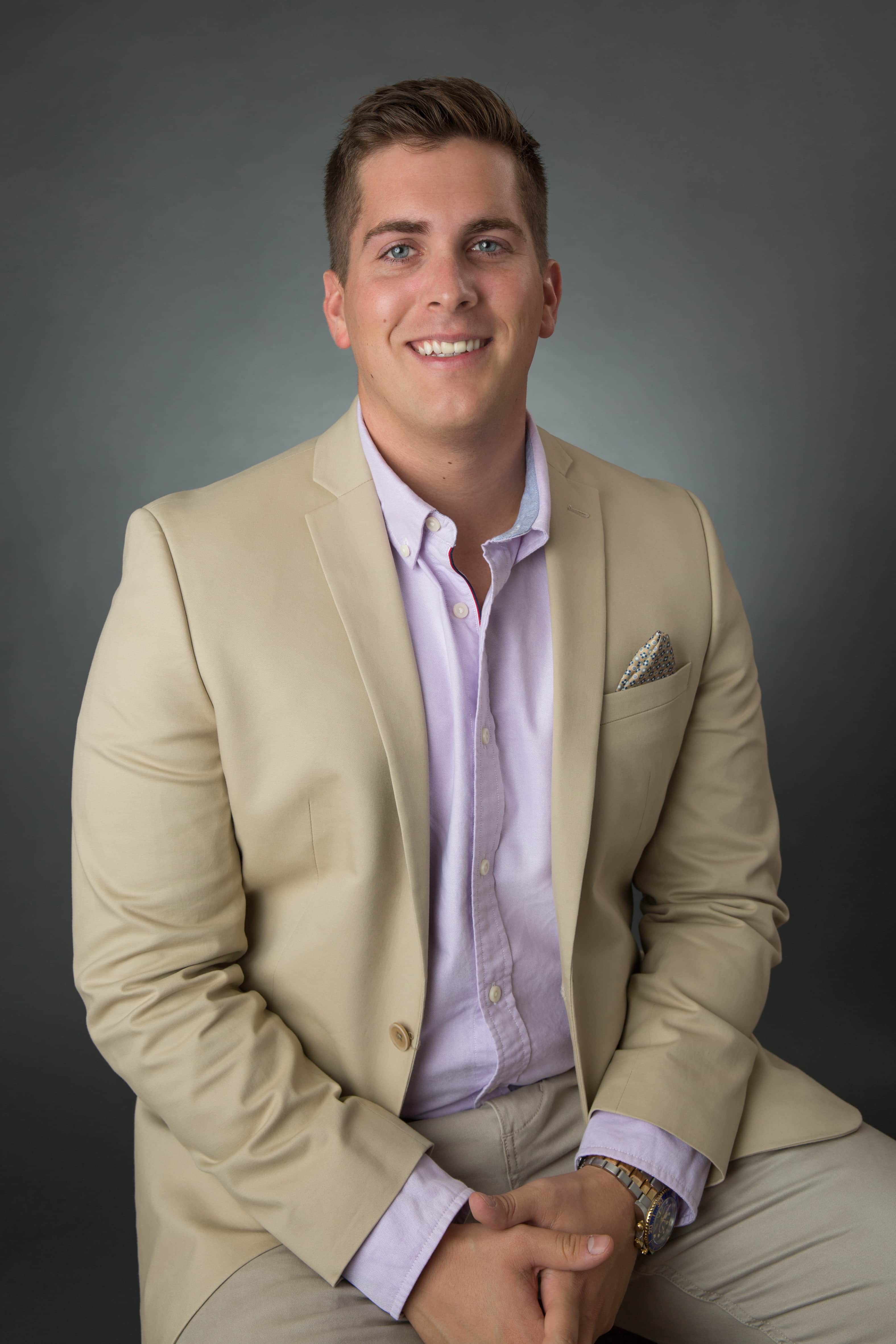 young male realtor being suit